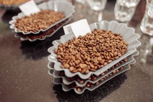 Many bowls with different types of coffee for tasting