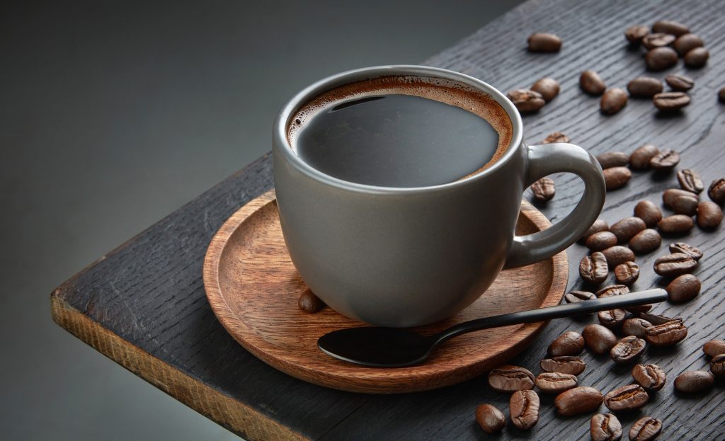 Freshly brewed black coffee in a cup